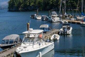 A white ferry at the port in Bowen Island.