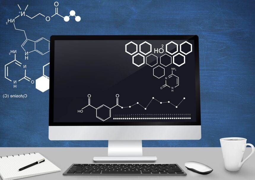Computer desk with H2O formula displaying on it.