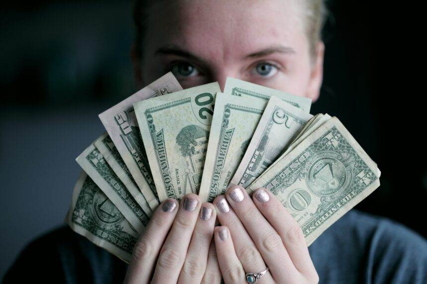 A picture of a man with lots of money