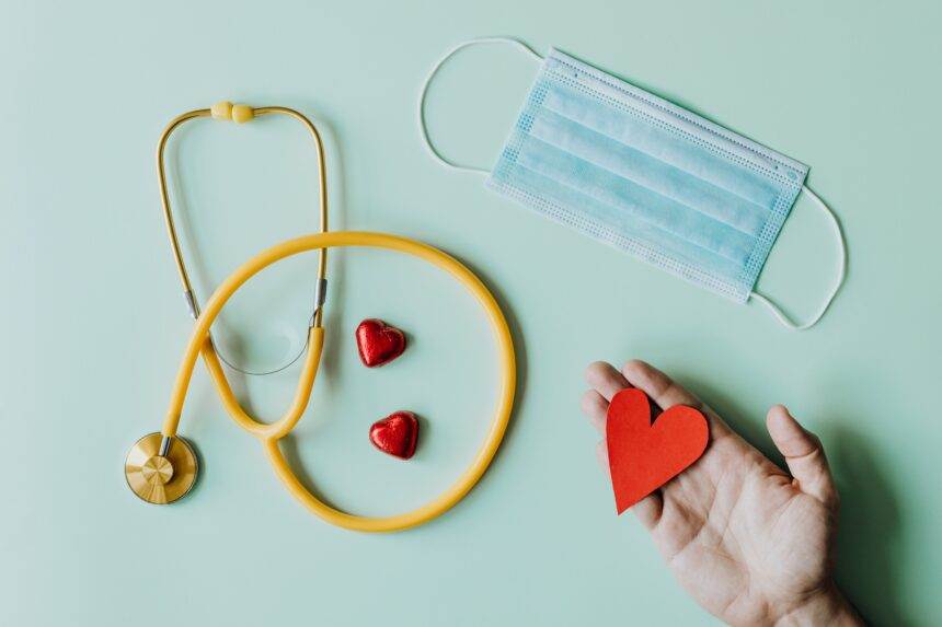 Healthcare equipment is displayed on a plain surface.
