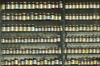 Shelves filled with pill bottles.