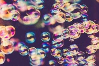 A view of bubbles giving holographic reflection in the air.