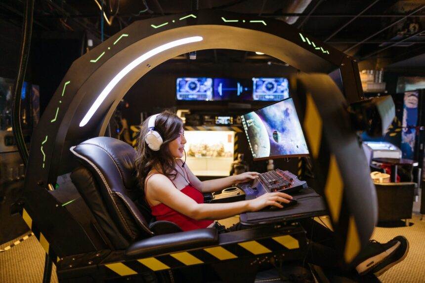 A woman playing a game on a computer.