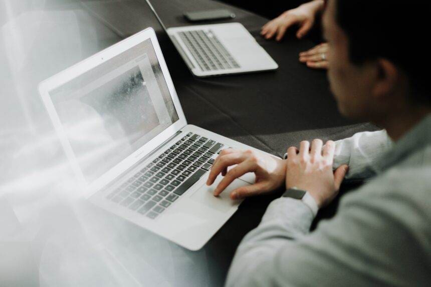 A man work on laptop