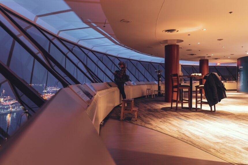 Views of people looking at the skylines at Vancouver Lookout.