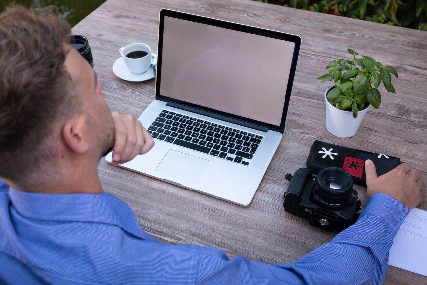 a person working on a laptop.