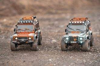 hot wheels cars on the dirt ground.