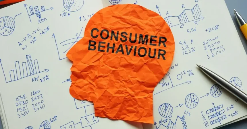 Crumpled paper with Consumer Behaviour on marketing analysis chart.