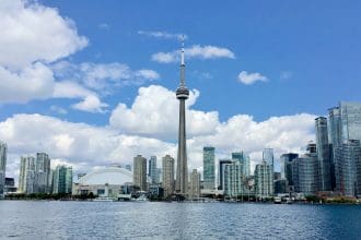 Toronto skyline with CN Tower and waterfront.
